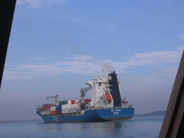 Container ships share the waters with the ferry between Ernakulam and Ft Cochin