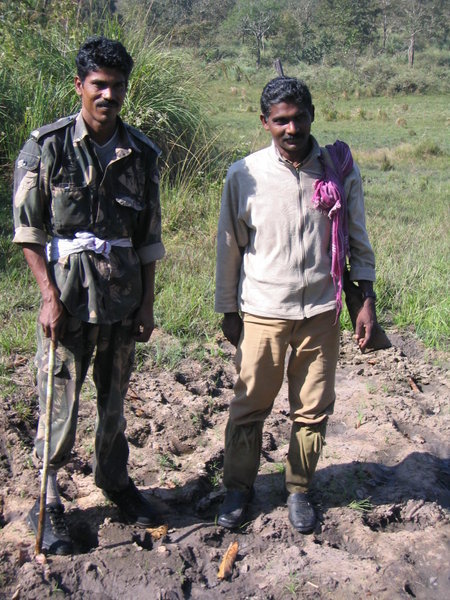 Two of the hiking crew, standing near tiger tracks (not visible)