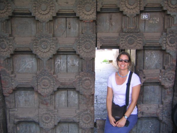 In front of historically noteworthy doors of the we-help-you-glue-your-form-to-the-package shop.