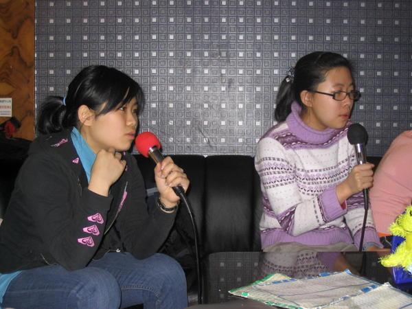 gladys and my host girl doing karaoke