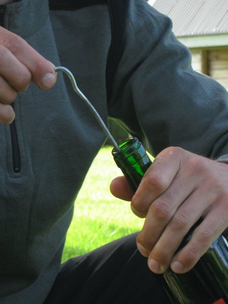Opening the Wine Bottle with a Tent Stake
