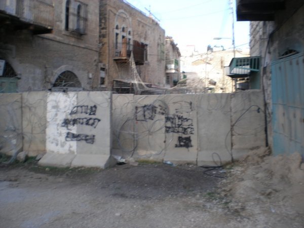 Fence dividing Jewish and Arab neighborhoods