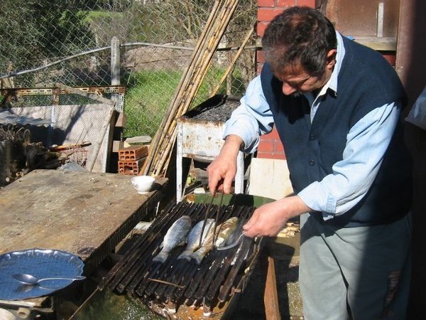 Michael grilling fish
