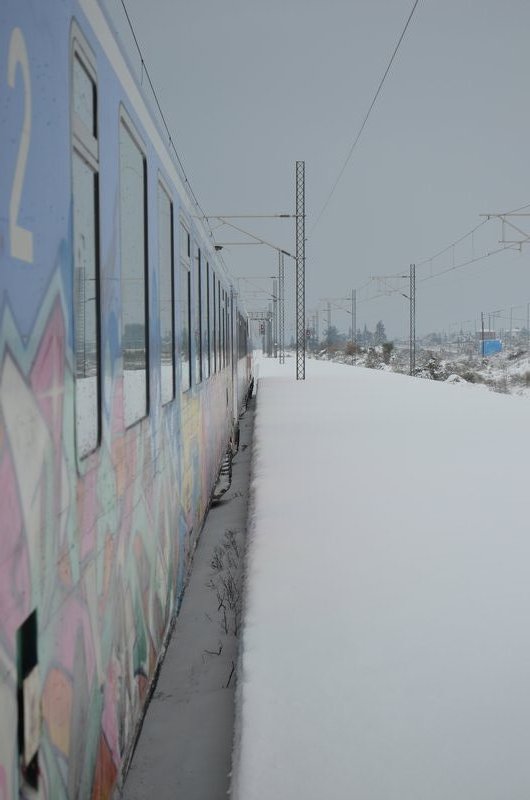 Side of the train at a station