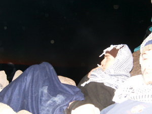 Us curled up on top of the mountain.
