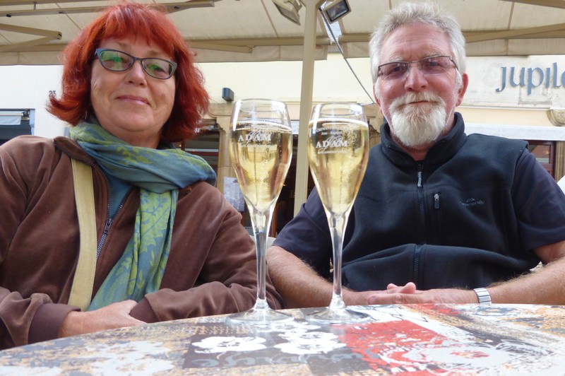 a glass of cremant at a  Colmar cafe - the perfect acompanyment for tourist watching
