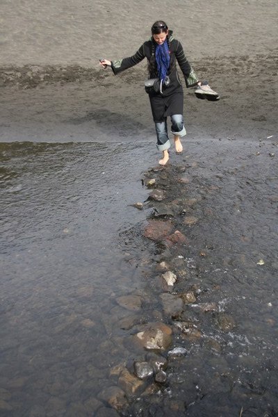Talita crossing the river