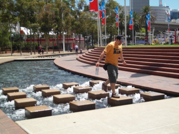Rich in the fountains at Darling Harbour