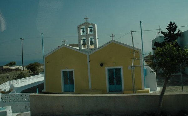 A yellow chapel from the bus