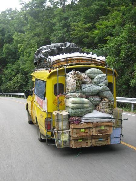 An overloaded delivery truck