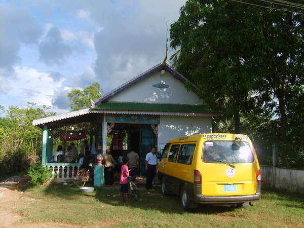 Sipar van at communal house in countryside