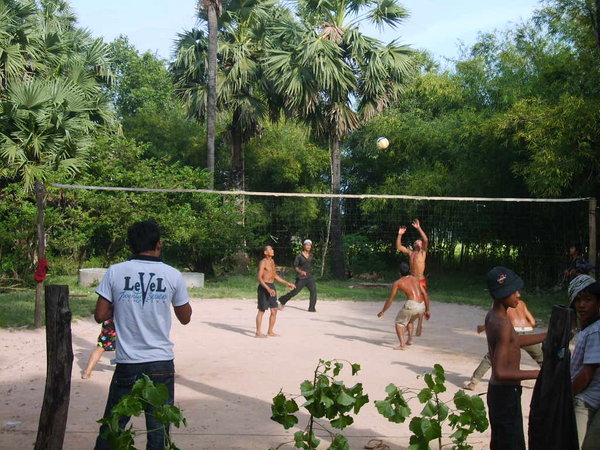 playing volleyball at potters' village