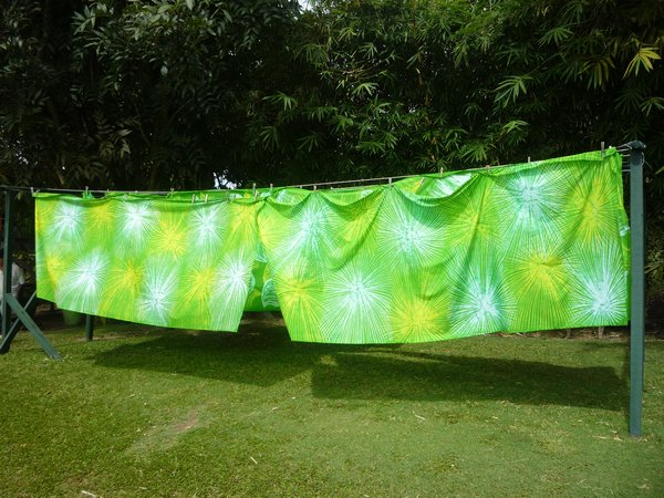 Batik fabric hanging to dry.