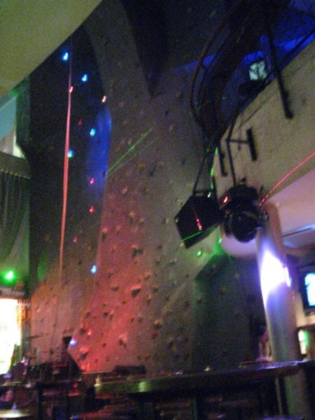 The completely insane crazy climbing wall in the bar