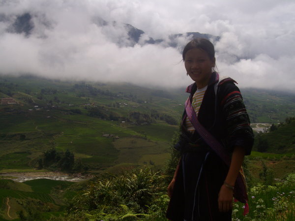 Our excellent Hmong guide in traditional clothing who helped us along the rice terraces