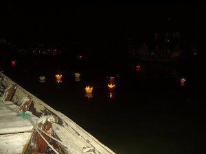 Lanterns floating down the river during the lunar festival