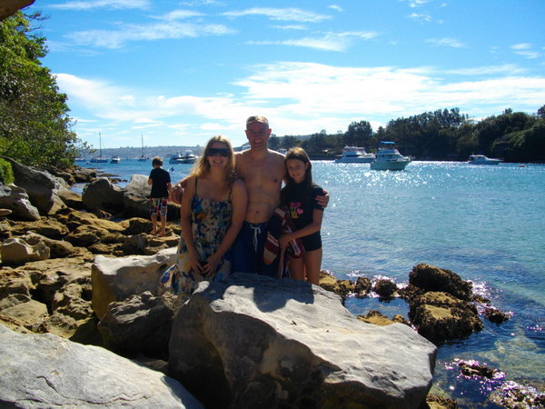 Amy, Andy and Georgie hunting for spiders among the rocks at Collins Beach