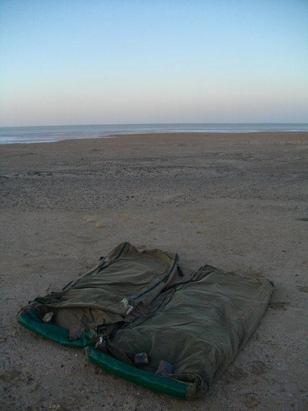 Our swags at the edge of Lake Eyre South