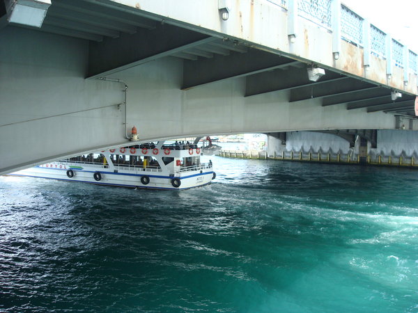 Ferry Under Galata Bridge