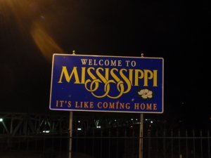 Welcome sign on the bridge from Louisiana