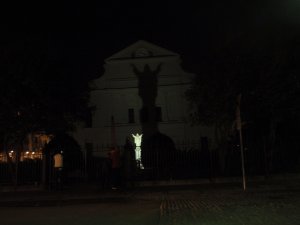 Statue casting a shadow on St. Louis Cathedral