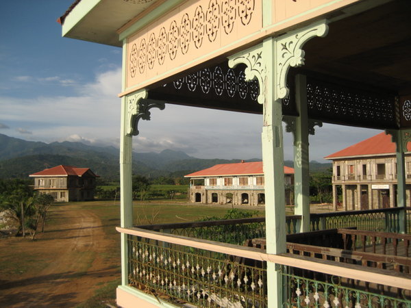 Veranda-Framed View of Colonial Houses