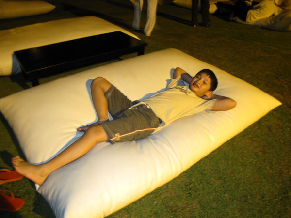 Martin Trying the Outdoor Bed in Sofitel