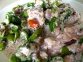 Bicol Express is Chopped up "sili" or local peppers, stewed in coconut cream with chunks of pork.  Heavenly!