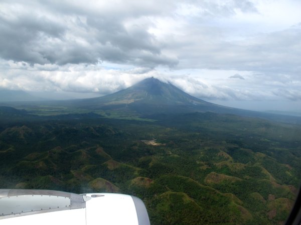 Aerial Shot of Mount Mayon: Taken from Seat 9 A.  So lovely to look at, with the "Pili" Hills in the foreground. 