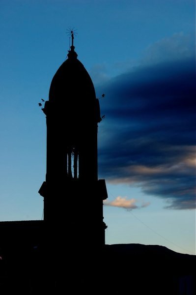 Church steeple in the evening light in Nobsa.