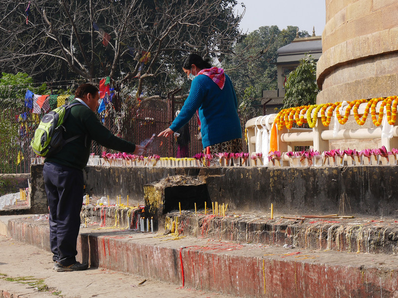 Pilgrims paying respect at the Dhamek Stupa