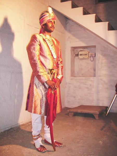 The groom in ceremonial costume