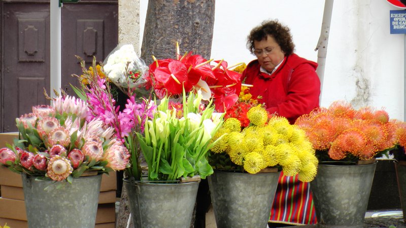 Flower seller at the entrance to the market