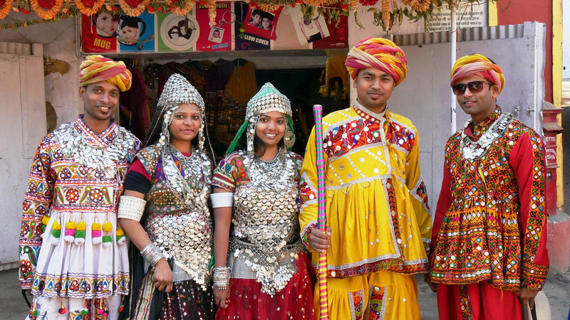 Gujarati visitors dressed up in local costume