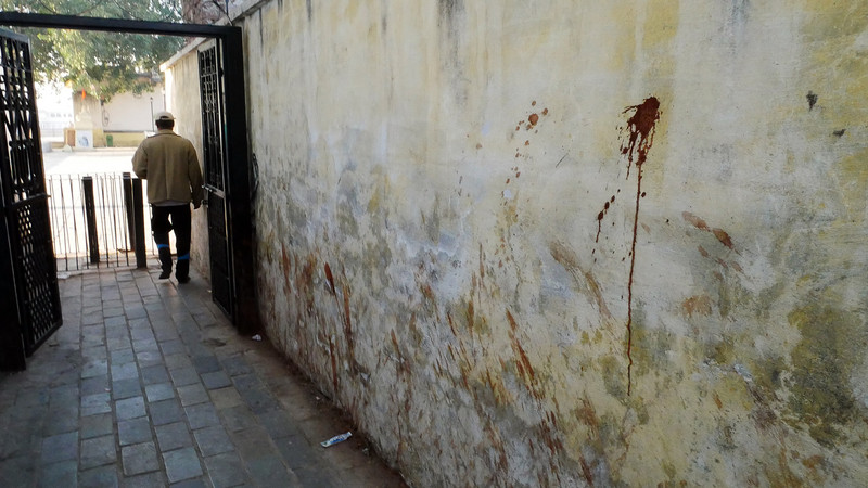 An alleyway - note the betel juice spit stains!