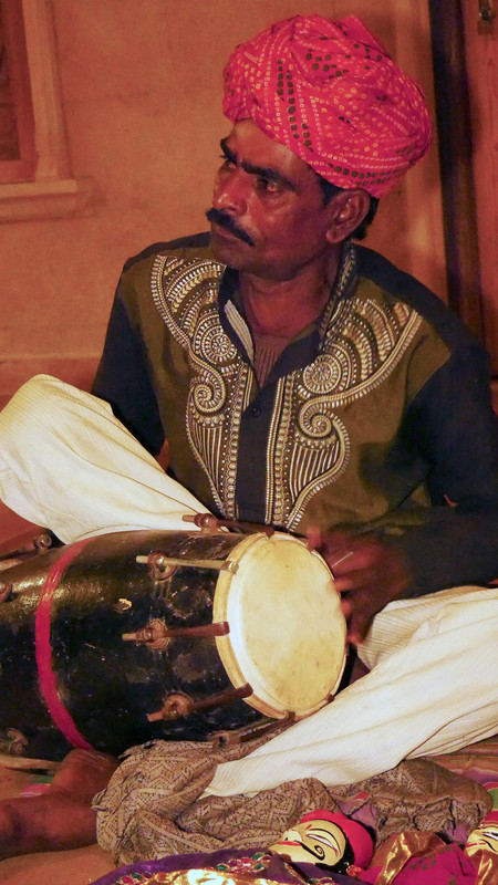 A relative plays the dholki
