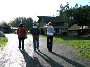 Erin, Mo and Kellan walking in the farm in a sunny afternoon