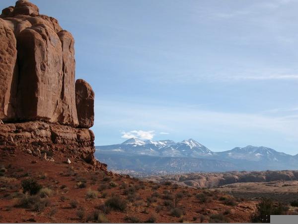 A view of snowcapped mountains from the arches